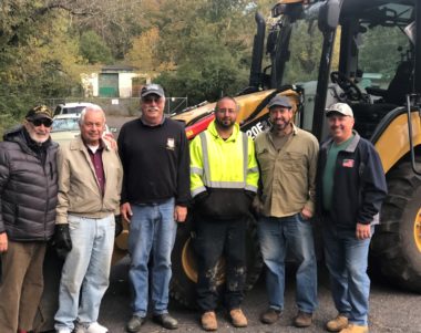 Suez lends bulldozer and volunteers to help clear property for Rockland Homes for Heroes construction