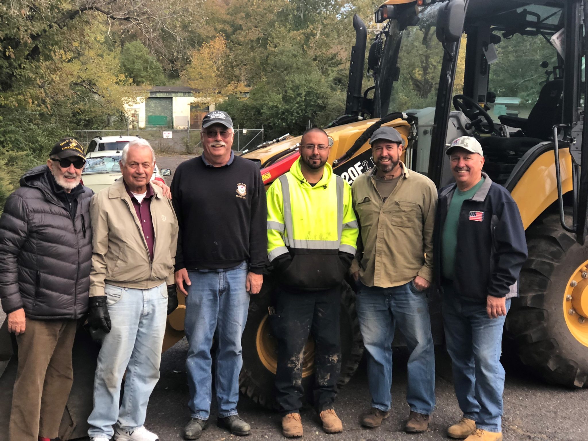 Suez lends bulldozer and volunteers to help clear property for Rockland Homes for Heroes construction