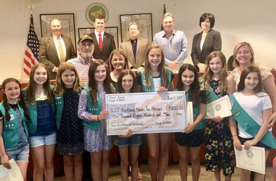 Nanuet Girl Scout Troop 40309 presents a check for $1800 to Rockland Homes For Heroes